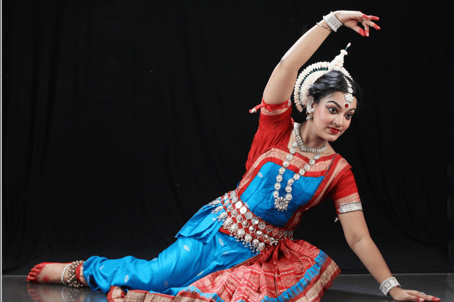 Odissi dancer in blue costume