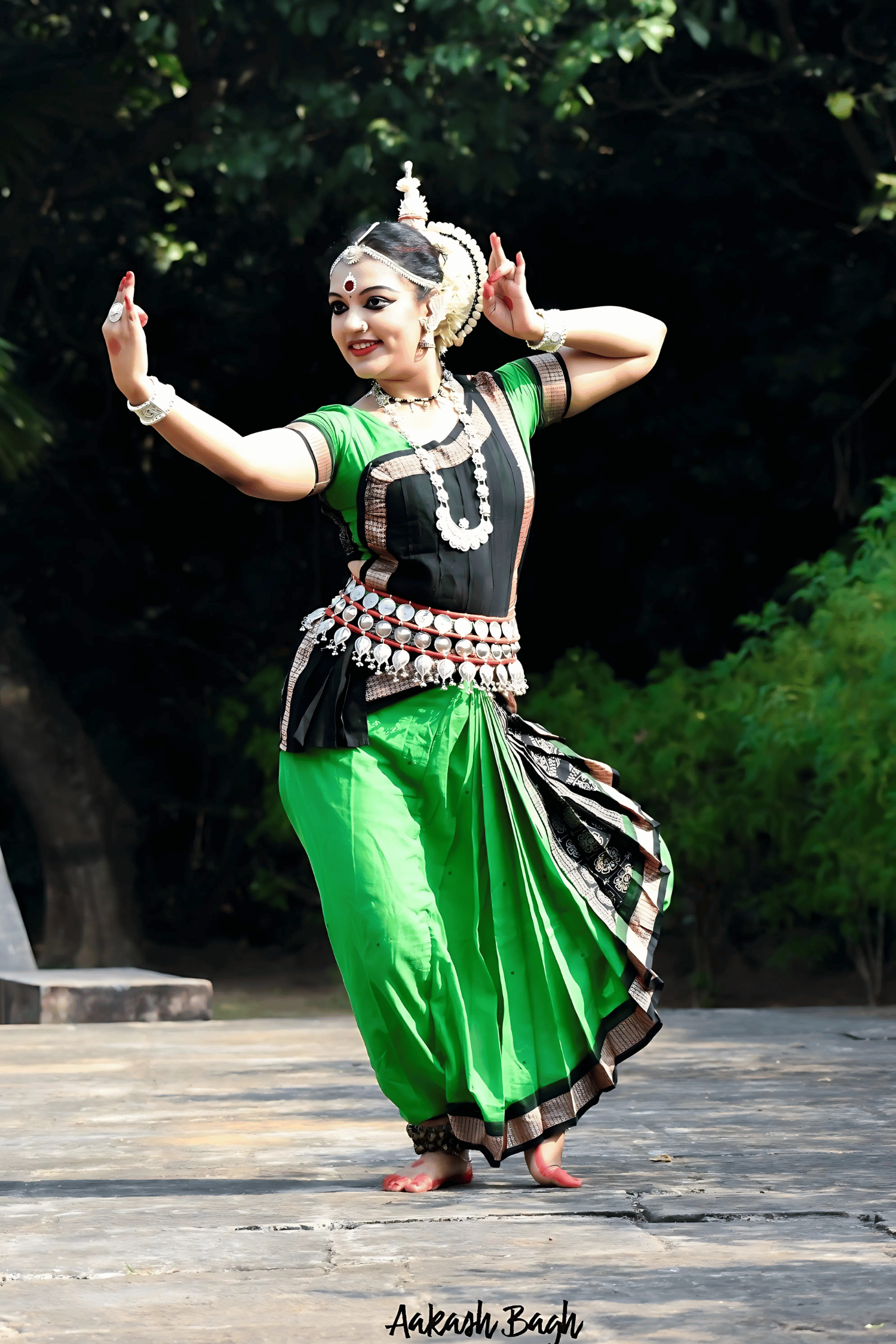 Odissi dancer in green costume
